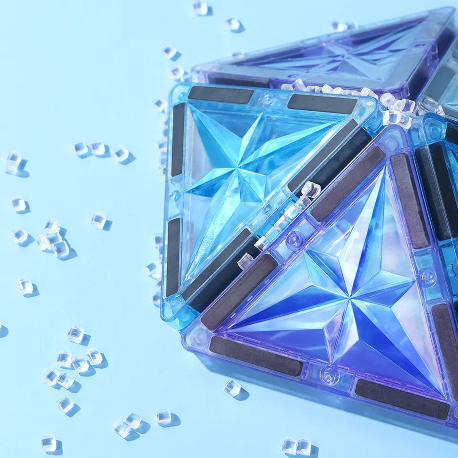 Magnetic Tiles Starshine – 100 piezas en tonos cristal, azul y morado con carrito y muñeco incluidos
