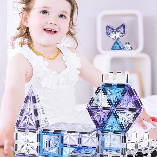 Magnetic Tiles Starshine – 100 piezas en tonos cristal, azul y morado con carrito y muñeco incluidos